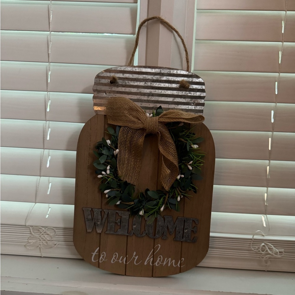 Rustic Welcome Sign with Greenery and Bow